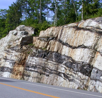 Rock formation near a paved road