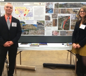 Students with a research poster